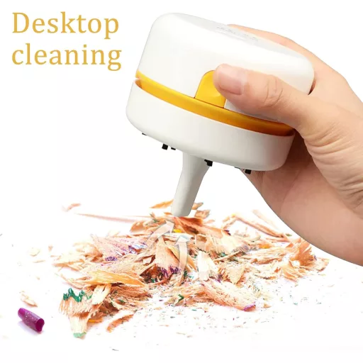 Mini aspirator portabil USB pentru birou, ideal pentru firimituri și tastatură.